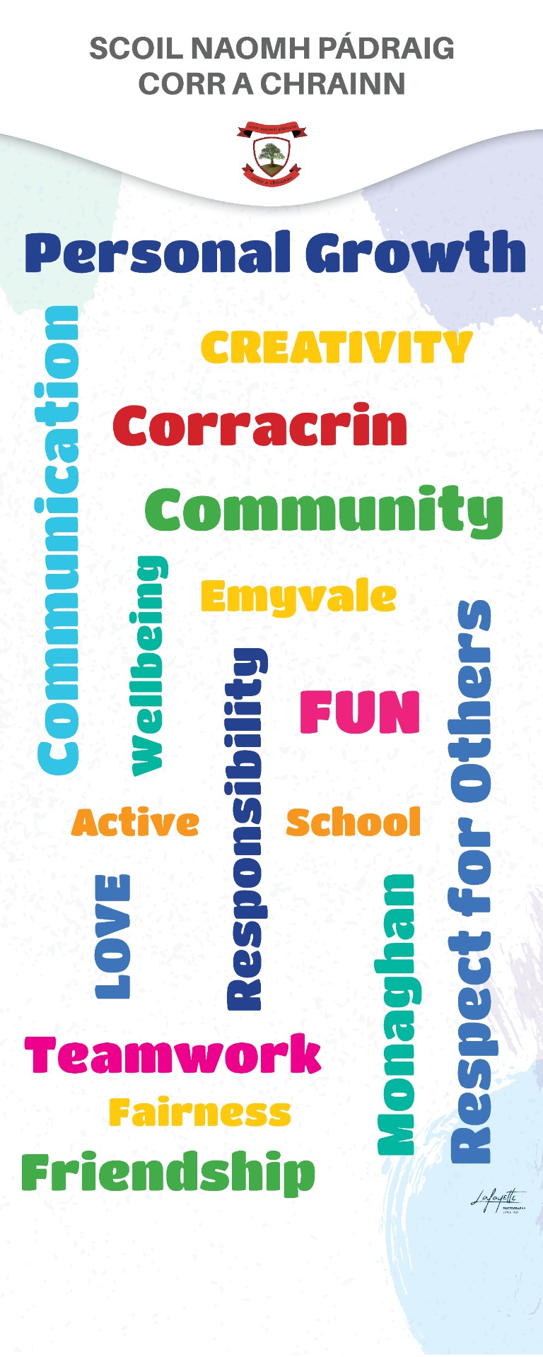 Colorful school poster with Irish text and words like Personal Growth, Creativity, Community, and Fun.
